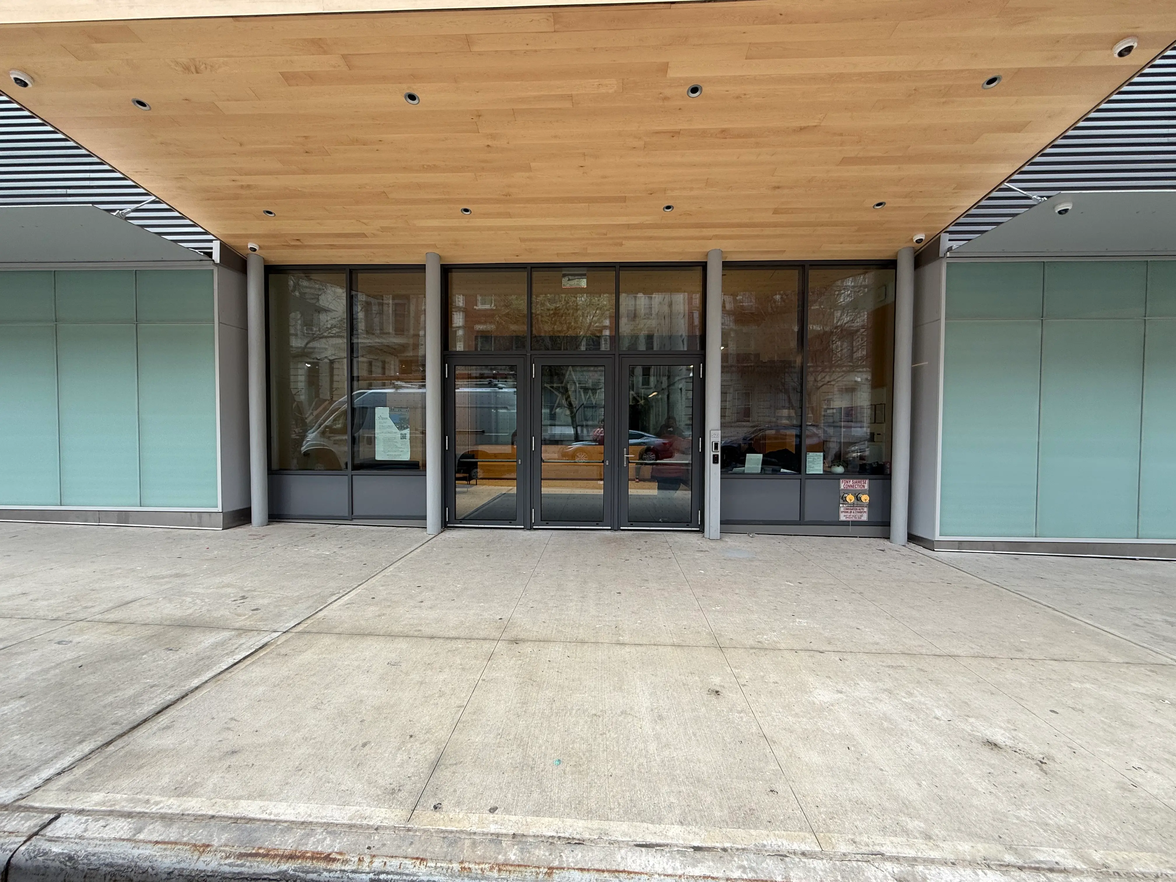 PTZ security camera on commercial building exterior